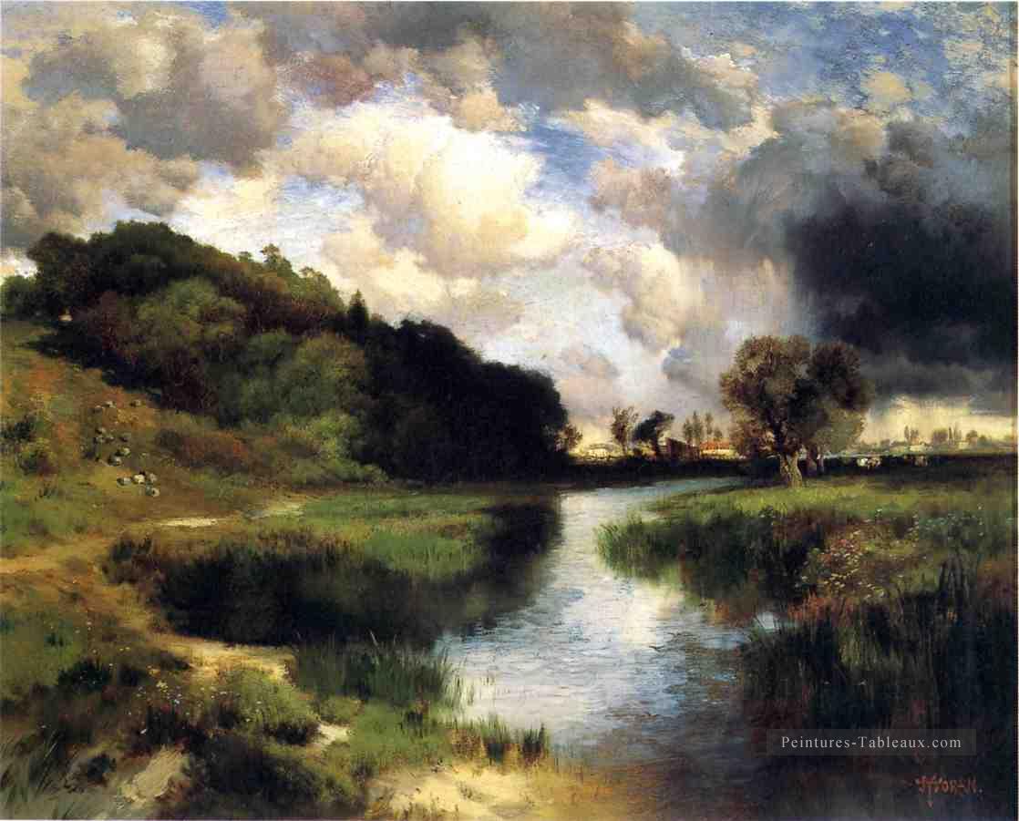 Journée nuageuse au paysage d’Amagansett Rivière Thomas Moran Peintures à l'huile